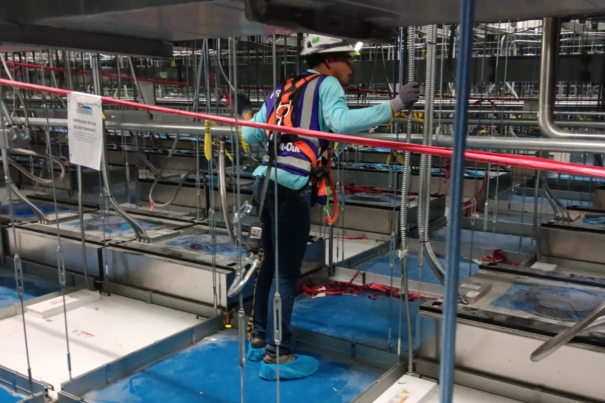 Working from a platform above a process floor
